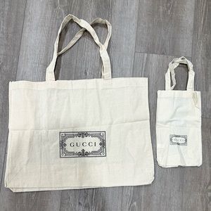 2 Gucci shopping bags